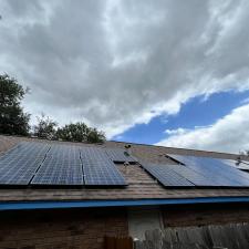 Solar panel driveway cleaning